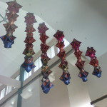 "Golden Rhapsody," a fiber sculpture by artist Priscilla sage, hangs near the south wall of the Perry Public Library.