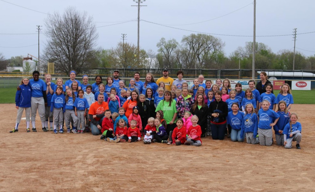 The Perry Girls Softball Association gathered at Pattee Park last April for their opening ceremony. The 2016 season will kick off with festivities at Paul and Mary Ann Graves Diamond April 26.
