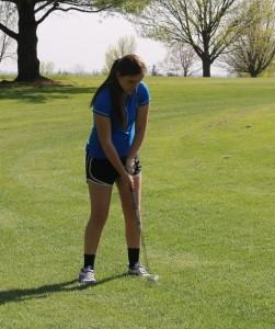 Sarah Sweet chips on the second hole.