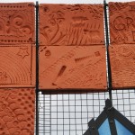 Clay tiles bordering the panel encourage dreaming and trying.