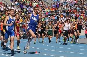 Perry senior Keegan Pfau leads takes off during a waterfall start at the beginning of the 3200 run at the state track meet in Des Moines Thursday.