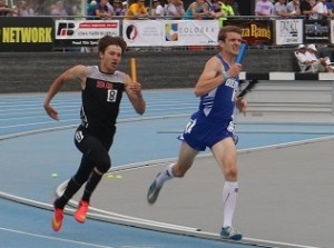 Keegan Pfau tries to hold off a competitor as they enter the homestretch of the 4x400 Friday. Pfau finished sixth in the 1600 Saturday with a personal-best time of 4 minutes, 30.9 seconds.