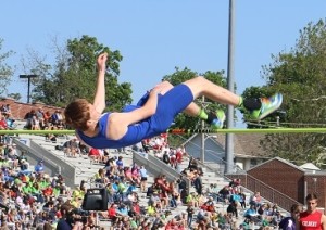 Scott James sails over the bar at 6'1, a jump that would help ensure the senior would medal at the state meet.