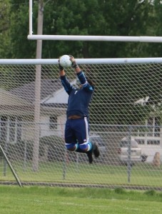 Perry keeper Jorge Soto makes a save off a free kick late in Thursday's 1-0 win over Iowa Falls-Alden/AGWSR in a Class 2A Substate 7 Semifinal at Dewey Field.