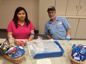 Perry blood donors Maritza Saldana, left, and Jeff Hix rest and recharge after donating their pints.