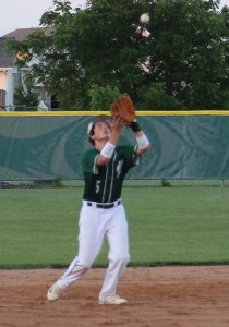 Shortstop Brady Aunspach waits for a pop fly to land in his glove.
