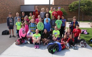 Most -- but not all -- of the Perry Summer Swim Team members that competed at Glidden Tuesday pose before boarding their bus.