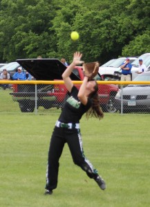 Second baseman Alison Soelberg retreats into short right field to make this catch.