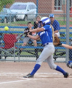 Perry's Alyssa Kruger rips a RBI-triple down the right field line against Bondurant-Farrar at the PAC July 1. Kruger finished with four doubles, tied for second-most in the Raccoon River Conference. 