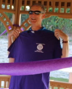 Marcus Carris of Perry a Walk to End Alzheimer's T-shirt, part of the swag available to donors at the charity fundraiser.