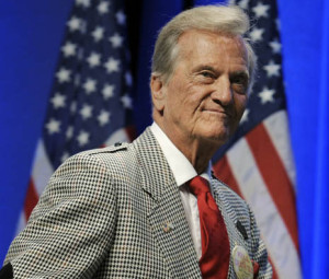 Singer Pat Boone walks offstage after receiving the Conservative Political Action Conference (CPAC) Lifetime Achievement Award in Washington, Saturday, Feb. 12, 2011. (AP Photo/Cliff Owen)