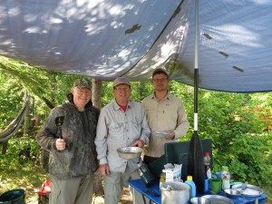 For fishing friends, from left, Ty Smedes, Mike Delaney and Connor Delaney, blueberry pancakes were one of the treats on the annual Boundary Waters Canoe Area fishing trip.