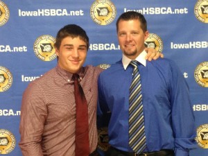 Woodward-Granger's Michael Connor poses with Hawk head coach Eric Evans during the Academic All-State ceremony in Clinton Saturday. Connor and teammates Alex Bodermann and Tre Loge all earned the highest distinction from the Iowa High School Baseball Coaches Association.
