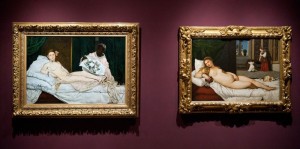 Manet's "Olympia," left, and Titian's "Venus of Urbino" were the 19th and 16th century models for the Modernist woodcut version in the Cellar at La Poste.