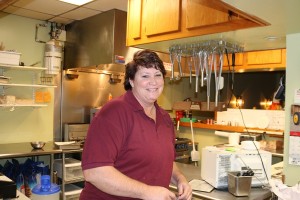 Cherie Schuttler will continue cooking hearty American dishes at Lou's Diner in Woodward after her mother sold the business.