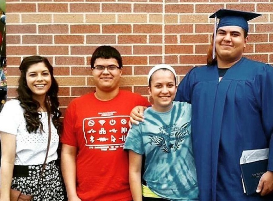 Graduation day was a happy day for the Marquez siblings of Perry, from left, Lourdes, Trevor, Nailea and Omar.