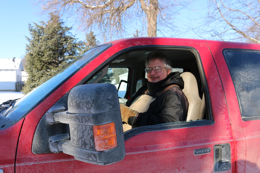 Loren Mitchell of rural Adel played the Good Samaritan Friday morning to a Perry motorist in distress.