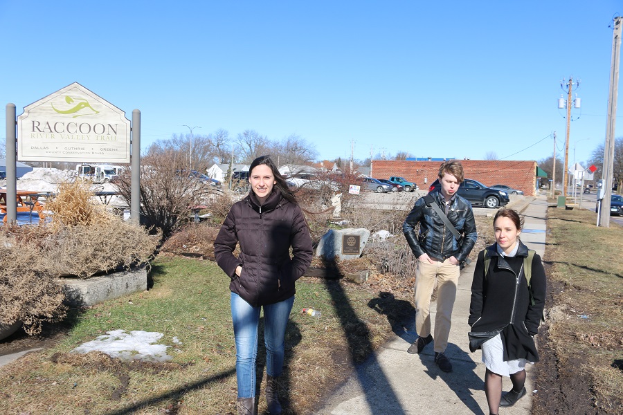 Drake environmental science and policy students, from left, Caitlin Ryan, Tyler Rhimes and Shanna McCormack said the Rotary Club garden in Caboose Park in downtown Perry is a good example of managing stormwater using green infrastructure.