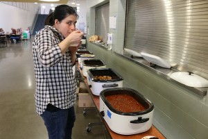 Kaci Kennedy of Woodward judges the chili at the W-G high school Sunday.