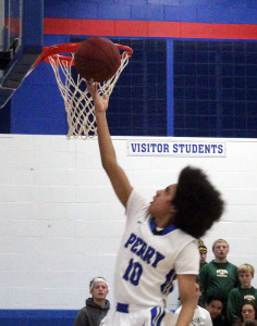 Rashon Ivory scores for Perry Tuesday during a non-conference tilt with Saydel.