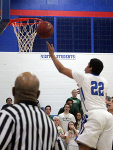 Perry's Shammond Ivory drives for two points against Saydel Tuesday.