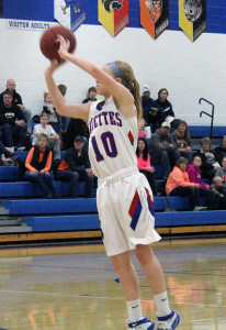 Perry guard Grace Stewart drains a 3-pointer in the first quarter against Carroll Wednesday.
