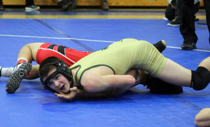 Ty Turner of Woodward-Granger is not quite able to pin Greene County's Knae Borgeson in the 113-pound sectional finals in Perry Saturday. Turner claimed the title with a 13-5 major decision.