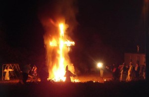 Ku Klux Klan members gathered at a cross burning in 2005.