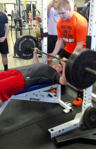 Tyler Soll spots Dalton Humpal on the bench press during the Perry Lift-a-Thon Feb. 25. Photo by Scott Pierce.