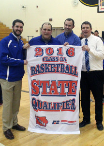 Perry coaches, from left, Adam Bloom, Jim Richmond, Jim Prombo and head coach Ned Menke pose with a banner that says it all.