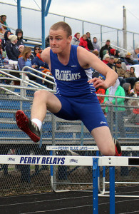 Beau Briles races toward the finish line in the shuttle hurdle relay.