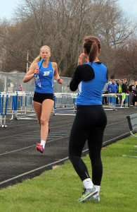 Mariah Duffy -- who ran the third leg -- cheers on Emma Olejniczak on the anchor leg of the 4x800 relay.