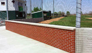 New cement and a brick backstop were some of the latest improvements made at the Woodward-Granger baseball complex.