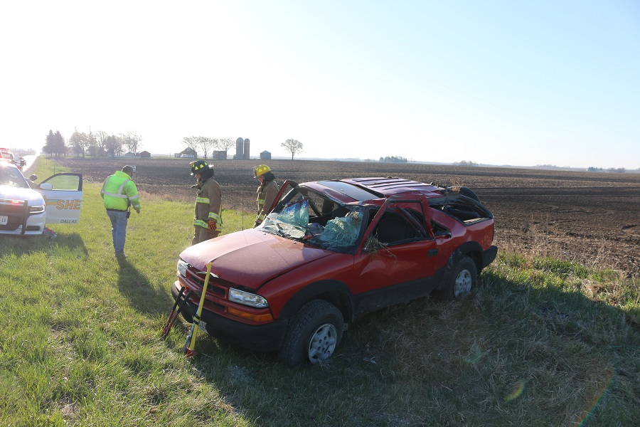 An 18-year-old driver was freed from the vehicle she was briefly trapped in Friday morning in an accident on Iowa Highway 44 east of J Avenue.