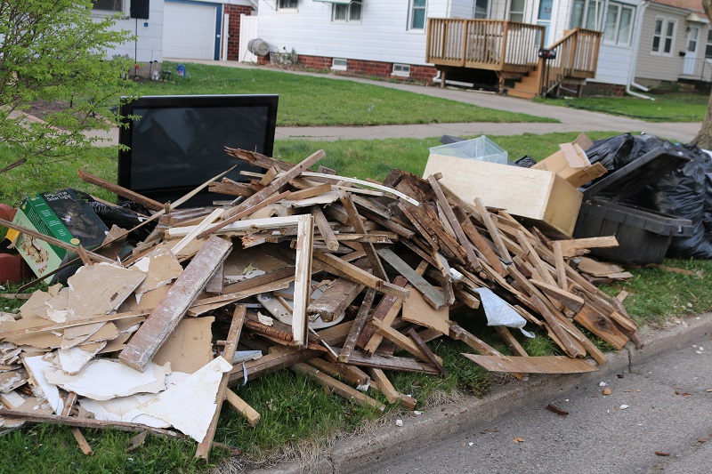 City workers will not pick up loose debris such as this. Loose debris must be placed in trash bags, sturdy boxes or other disposable containers no larger than a garbage can.