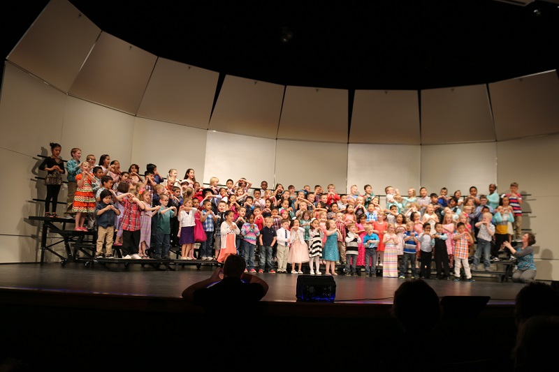 Perry Elementary School music instructors Shaylena Bell and Darin Schroeder directed more than 130 kindergartners in the 2016 Perry Elementary School Kindergarten Concert Thursday in the Perry Performing Arts Center.
