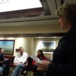 Perry librarian Jill Cook reminds the group of the criteria for picking the All Iowa Reads book.