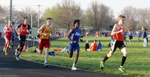 Juma Bushiri runs in the front pack after one of four laps in the 1600.