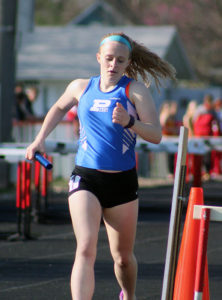 Haileigh Kenyon crosses the finish line on her anchor leg of the 4x800 relay.
