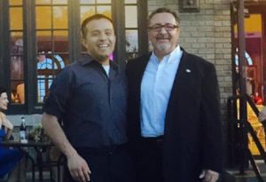 Eddie Diaz, left, and Dr. Rich Salas gave closing remarks at the Latino Progressive Dinner Friday in Perry.