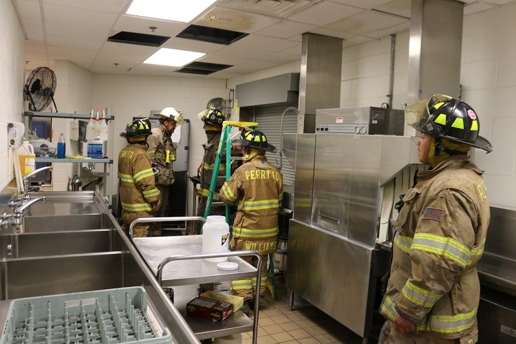 The Perry Volunteer Fire Department responded to the report of smoke in the kitchen of the Perry High School Monday morning.