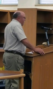 Dallas County Conservation Director Mike Wallace addressed the board concerning the Raccoon River Valley Bike Trail's request to use some 30 feet of school property as part of the connector trail between Perry and Woodward.