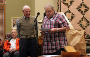 Longtime Perry High School educator Tom South was inducted by former student John Palmer, who, noting South's long tenure at PHS, brought along items both he and his son had made under South's tutelage in his "hard-grading shop class."