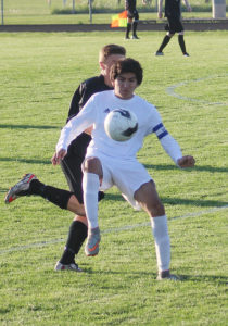Perry senior David Cardenas brings the ball under control against ADM May 10. Cardenas, who had both goals in a 2-0 win for the Bluejays, announced Monday he will take his talents to Grandview University.