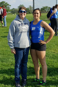 In 2006 then-senior Emi Einck (left) placed fifth in the discus for Perry at the state meet. Now the Jayette throwing coach, Einck has helped guide current senior Taylor Lathrum to state in the shot put.