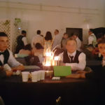 pry prom guys at table