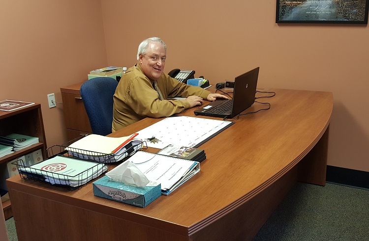 Dr. Randy McCaulley tied up the few remaining loose ends Friday before cleaning out his desk at the Perry Lutheran Home. The former superintendent of the Perry Community School District serves at the chief operations officer of the long-term care facility for 2.5 years.
