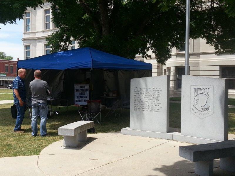 The marathon Bible reading is staged on the south lawn of the Dallas County Courthouse in Adel, near the memorial to the county's war dead.