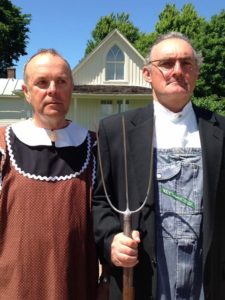 Dave, left, and Chris brought the roots of rural grimness to light when they stopped at the American Gothic House in Eldon, Iowa.