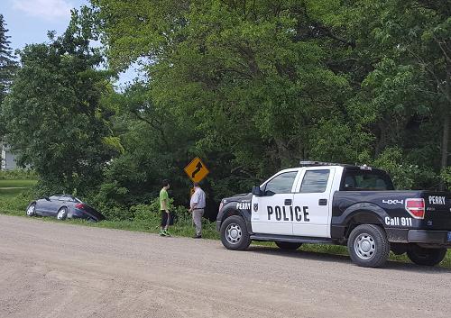 A Perry Police Department officer responded to a report of an automibile accident at 335th Street and Duck Avenue north of Perry Thursday shortly after 1 p.m.